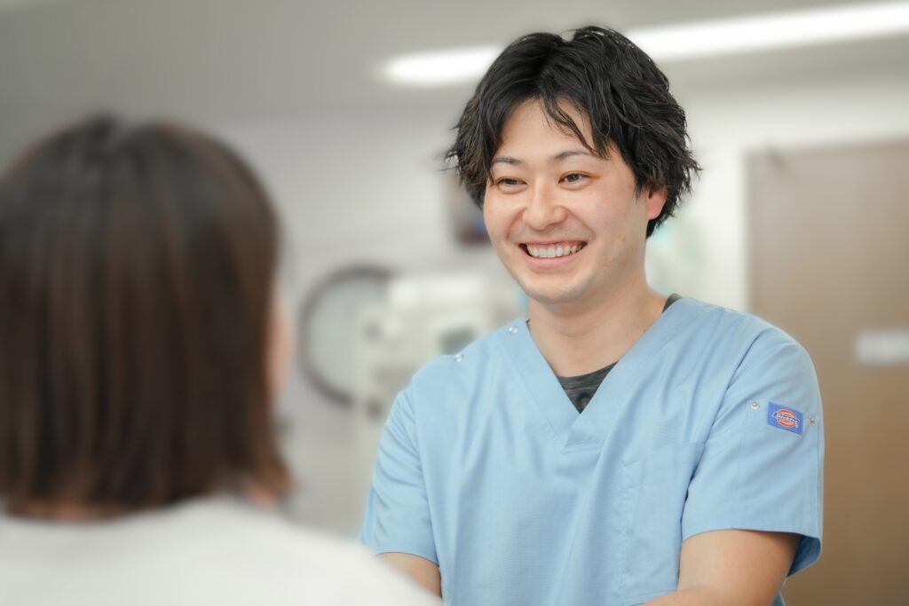 お会計時の院長笑顔写真